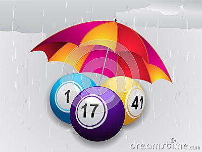 Winter bingo balls under umbrella Stock Photo