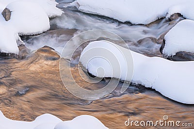 Winter, Boulder Creek Framed by Ice and Snow Stock Photo