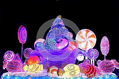 Winter Christmas decorative Lights display of a Candy Bar Stock Photo