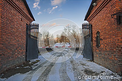 winter cityscape open vintage cast iron gate Stock Photo