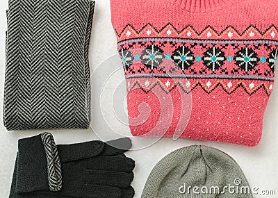 Winter clothes colored wool. Collar, gloves, hat, sweater Stock Photo