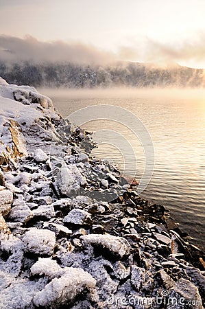 Winter cold foggy dawn on the Yenisei river Stock Photo
