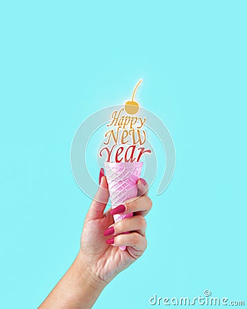 Winter concept of Happy New Year pink ice cream with cherry on top. Delicious sweet cornet for Christmas all the best wishes. Stock Photo