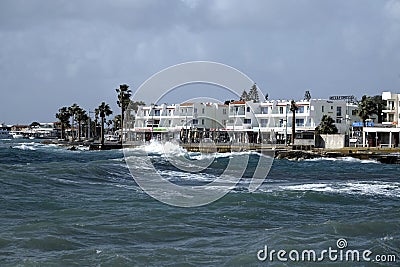 Winter in Cyprus. View from the sea to the quay in Kato Paphos on a cloudy winter day in January Editorial Stock Photo