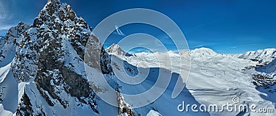 Winter drone shot of ski pistes and slopes covered with fresh powder snow in Tignes in Valdisere France Stock Photo