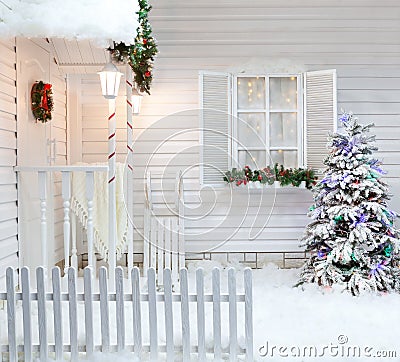 Winter exterior of a country house with Christmas decorations in the American style. Stock Photo