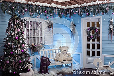 Winter exterior of a country house with Christmas decorations in Stock Photo