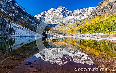 Winter and Fall foliage in Maroon Bells, Aspen, CO Stock Photo