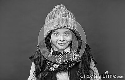 winter fashion. cheerful kid with curly hair in hat. female fashion model. teen girl in scarf. Stock Photo