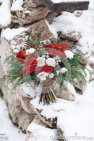 Bouquet with red flowers in winter Stock Photo