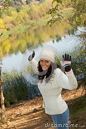 Winter girl by lake Stock Photo