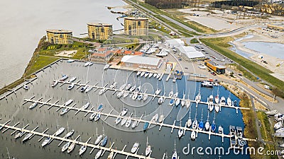 Winter harbour with plenty sailing boats shot from above Editorial Stock Photo