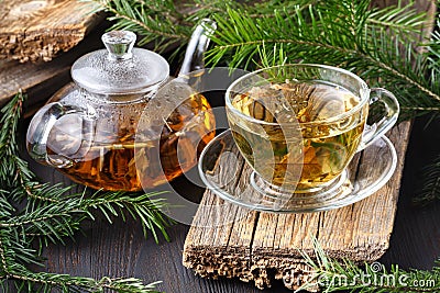 Winter healing orange drink with sea buckthorn, rosemary, spice, fir branches Stock Photo