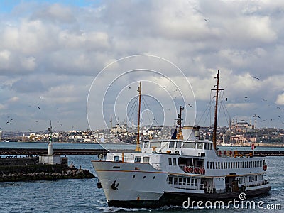 Winter in Istanbul, crossing from Kadikoy to Karakoy offers grea views of Blue Mosque, Hagia Sophia and cute city boats Stock Photo