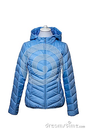 Winter jackets. Close-up of a stylish cosy warm blue down jacket for womans on mannequin isolated on a white. Fashionable women Stock Photo