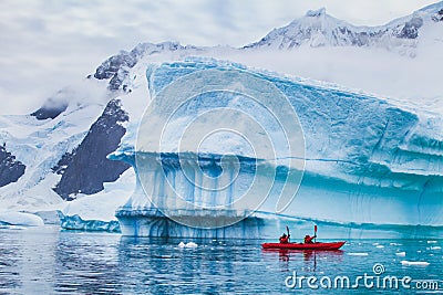 Winter kayaking in Antarctica, extreme sport adventure Stock Photo