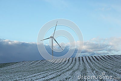 Winter landscape with lonely wind turbine, Daunian Mountains, Puglia, Italy Stock Photo