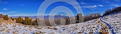 Winter Landscape panorama Oquirrh and Wasatch mountain views from Yellow Fork Canyon County Park Rose Canyon rim hiking trail by R Stock Photo