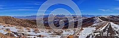 Winter Landscape panorama Oquirrh and Wasatch mountain views from Yellow Fork Canyon County Park Rose Canyon rim hiking trail by R Stock Photo