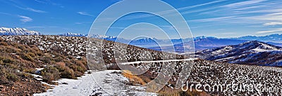 Winter Landscape panorama Oquirrh and Wasatch mountain views from Yellow Fork Canyon County Park Rose Canyon rim hiking trail by R Stock Photo