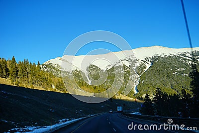 Road under snow mountain Editorial Stock Photo