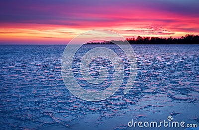 Winter landscape with sunset fiery sky. Stock Photo