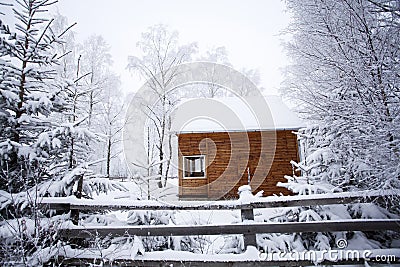 Winter landscapewith snowy mountain cottage Stock Photo
