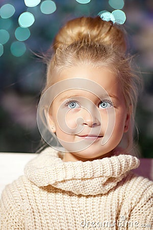Winter little girl. Smiling child. Cute kid. Stock Photo