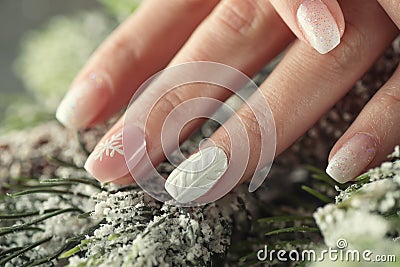 Winter manicure design nails, soft pink and white colour Stock Photo