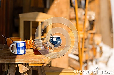 Winter morning breakfast outside wooden cottage Stock Photo