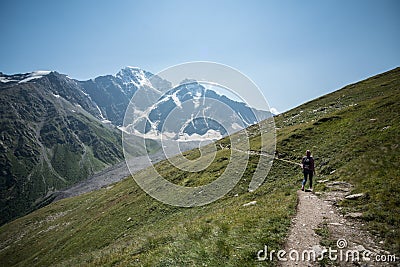 The trail on Mount Cheget in the direction of the glacier `Seven` Editorial Stock Photo