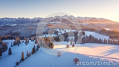Winter nature aerial view. Sunrise in Tatra mountains, Poland. Beautiful mountain nature in morning sunlight Stock Photo