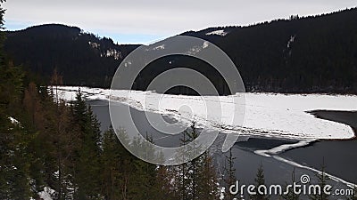 Winter over lake and mountains Stock Photo