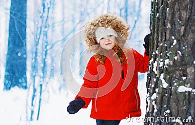 Winter and people concept - portrait child outdoors Stock Photo
