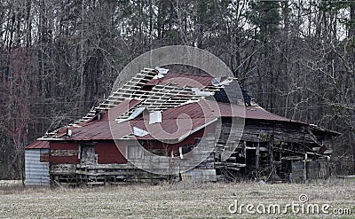 Dilapidated, Weathered Ruins of a Barn Editorial Stock Photo