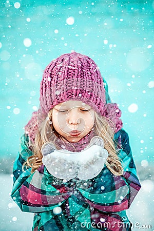 Winter portrait of a pretty little girl. Stock Photo