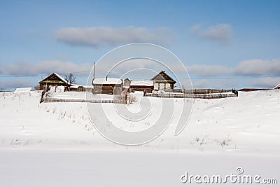 Winter rural landscape on the shore of the frozen river Stock Photo