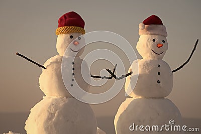 Winter sale. Snowman couple outdoor. Stock Photo