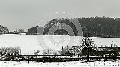 Winter scene around historic farm as well as water mill called Groenendaalsmolen in the valley of the river Gulp, South Limburg, N Stock Photo