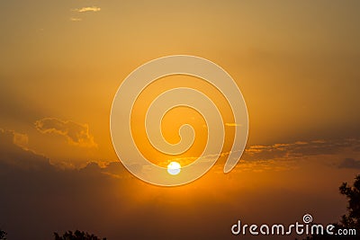 Winter Skies, Walking in the woodland, the mellow golden colours of this Sun Rise Stock Photo