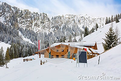 Winter snow chalet in Austrian Alps, Austria Stock Photo