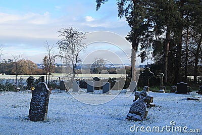 Winter Snow In An English Churchyard Stock Photo