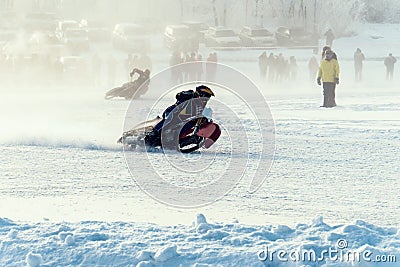 Winter Speedway. Racers unmarked drive on the ice road Editorial Stock Photo