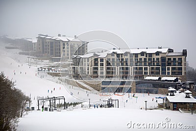 winter sports resort, with skiers and snowboarders taking advantage of the slopes Stock Photo