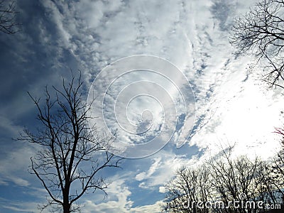 Autumn Winter stormy sky full of white clouds. Weather forecast concept. Oxygen, environment. Stock Photo