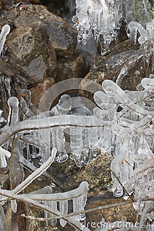 Winter stream with water, snow, icicles and stones #5. Stock Photo