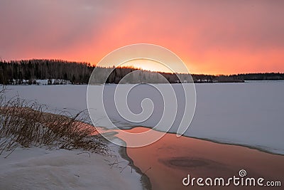 Winter Sunrise Mildred lake north of Fort McMurruy Stock Photo