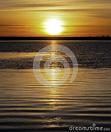 Winter Sunrise Over A Calm Colorado Lake Stock Photo