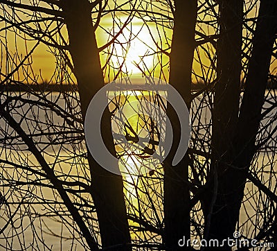 Winter Sunrise Over A Calm Colorado Lake Stock Photo