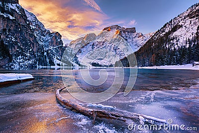 Winter sunrise over Lago di Braies, Dolomites, Italy Stock Photo